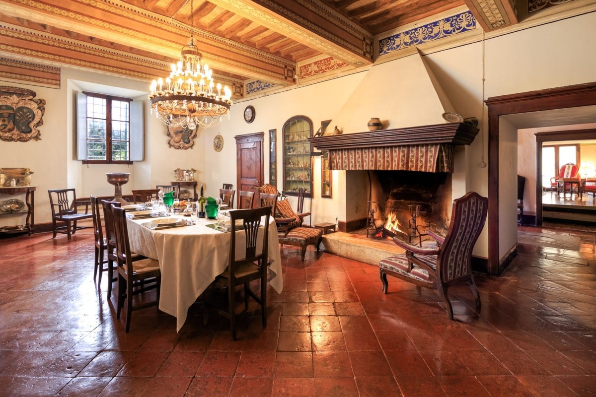 Spacious dining room with chimney